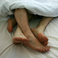 090616-gay-couple-bed